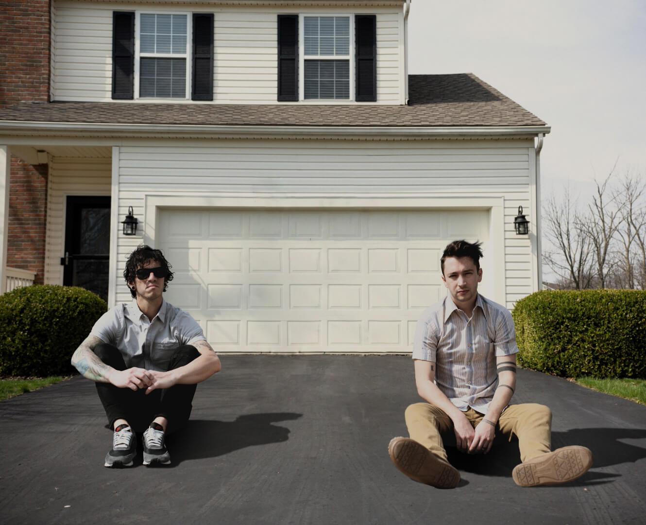 Twenty One Pilots band sits in their front driveway