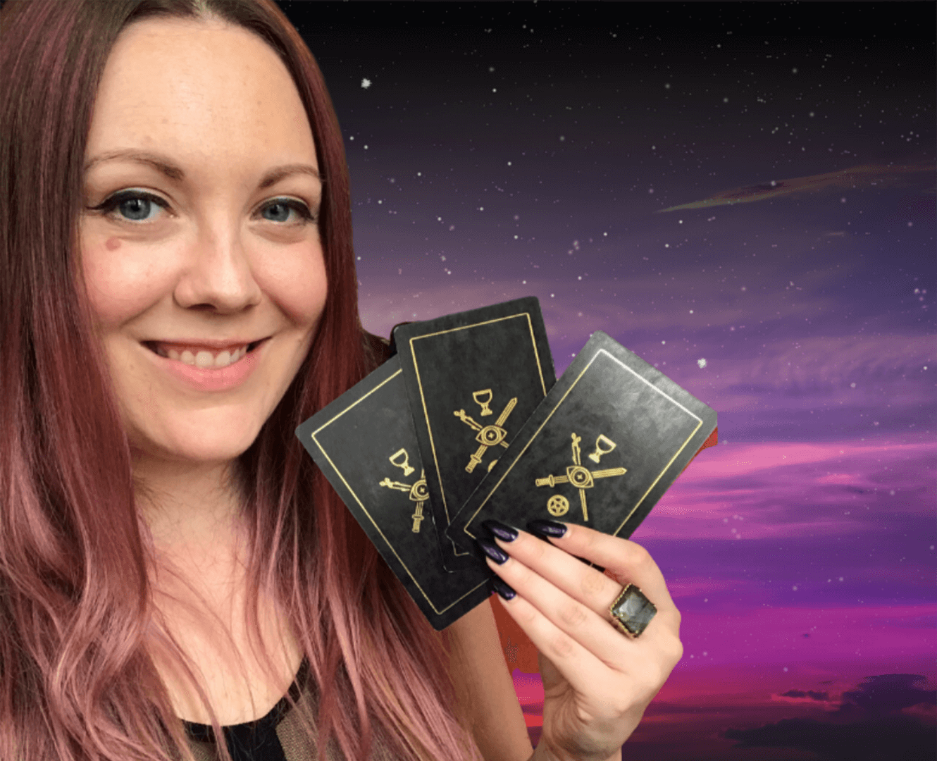 Woman holds tarot cards in front of purple sky backdrop.