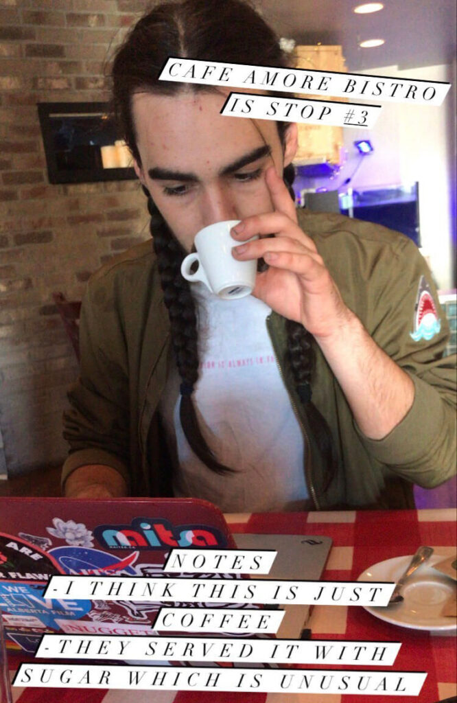 man sips a cup of espresso in coffee shop