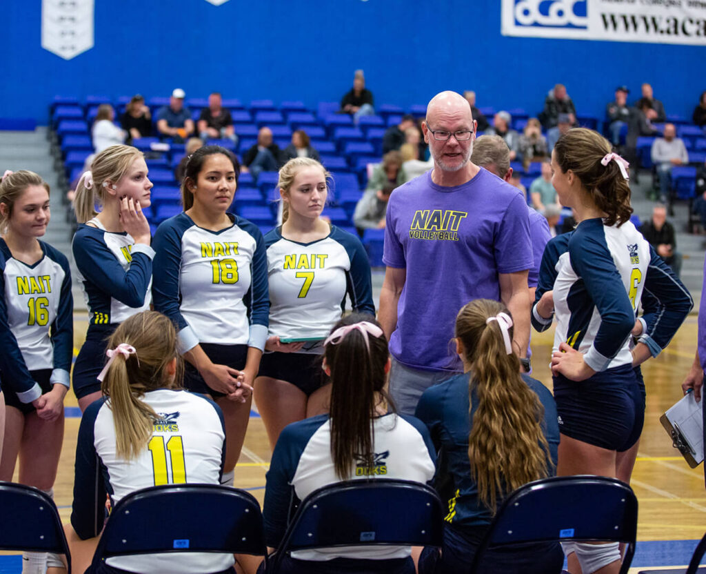 NAIT women's volleyball coach prepares team for a game