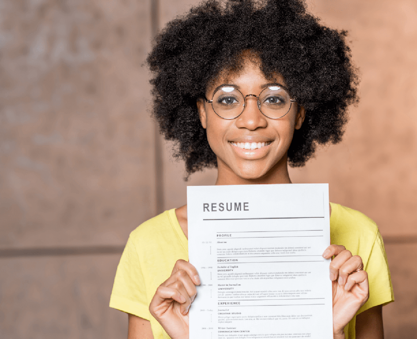 Woman holds resume