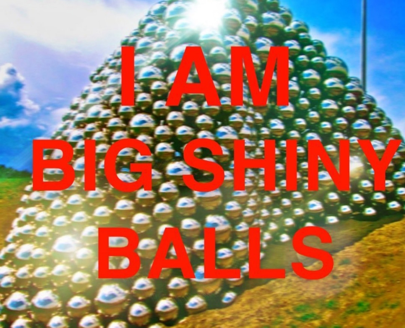 A picture of the silver balls in Edmonton with the caption "I am big shiny balls"