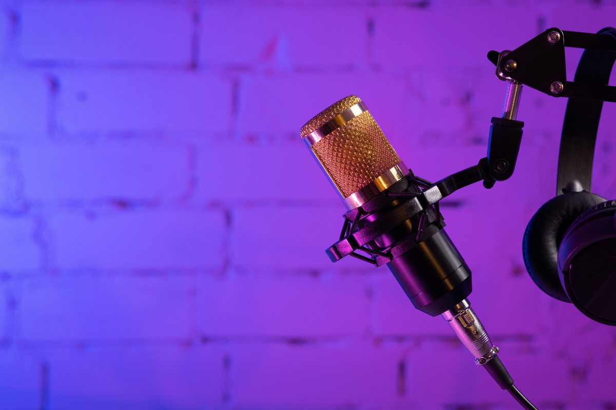 a photo of a microphone with blue and purple lighting