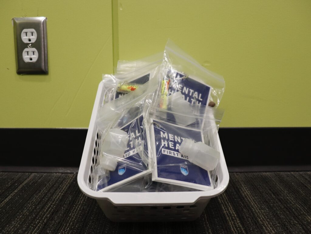 Basket with bags of first aid kits