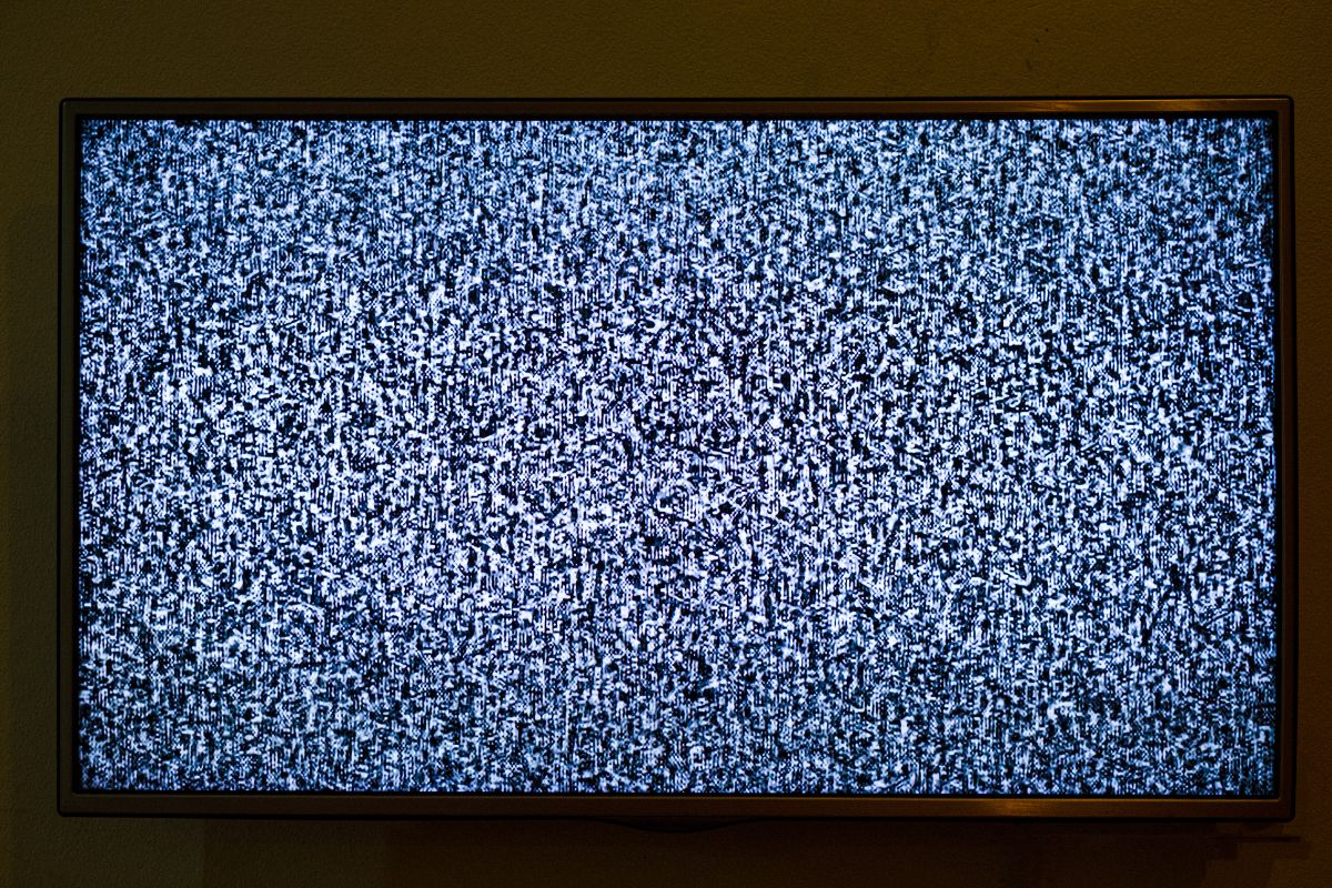 a close up of a television screen filled with static